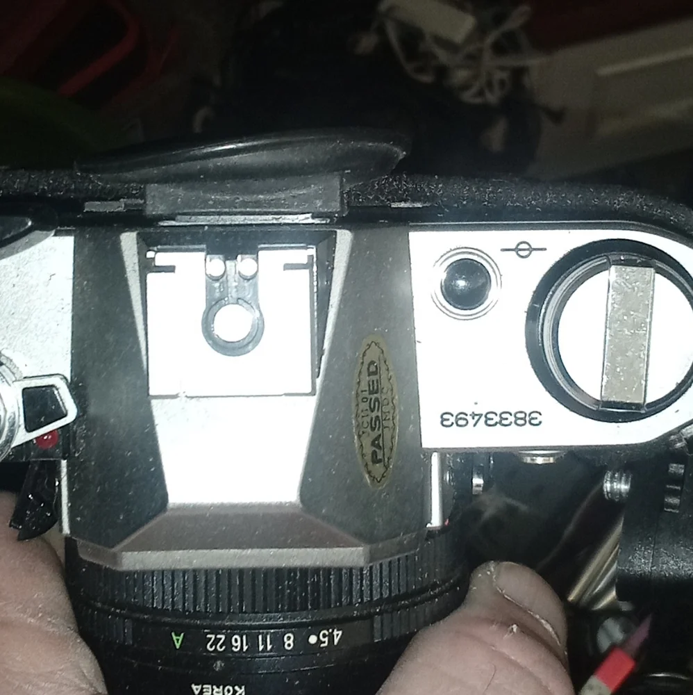 Canon AE1 Black and Silver SLR Camera with Pentax Flash and zoom lens